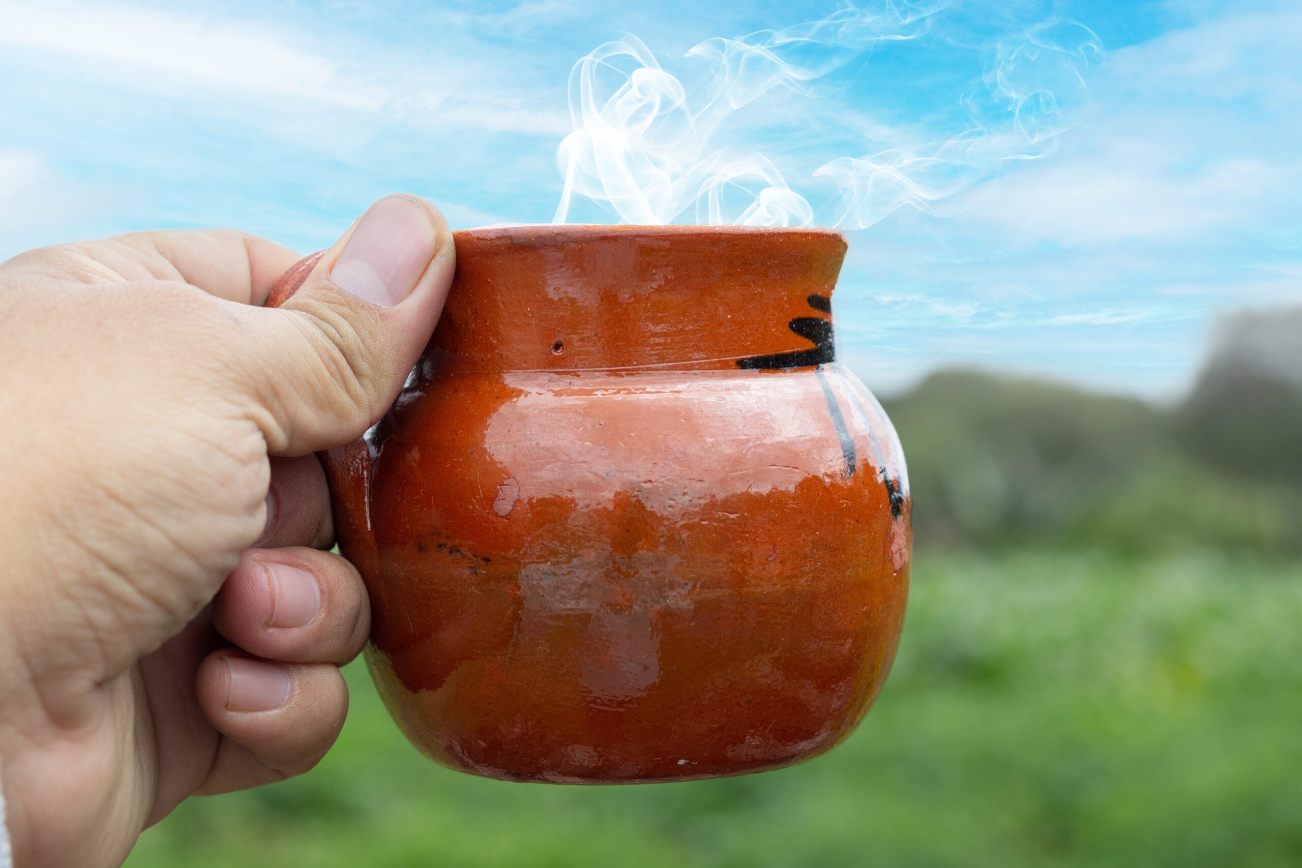 Personal,Perspective,Of,Man,Holding,Tradonal,Cup,Of,Mexican,Coffee